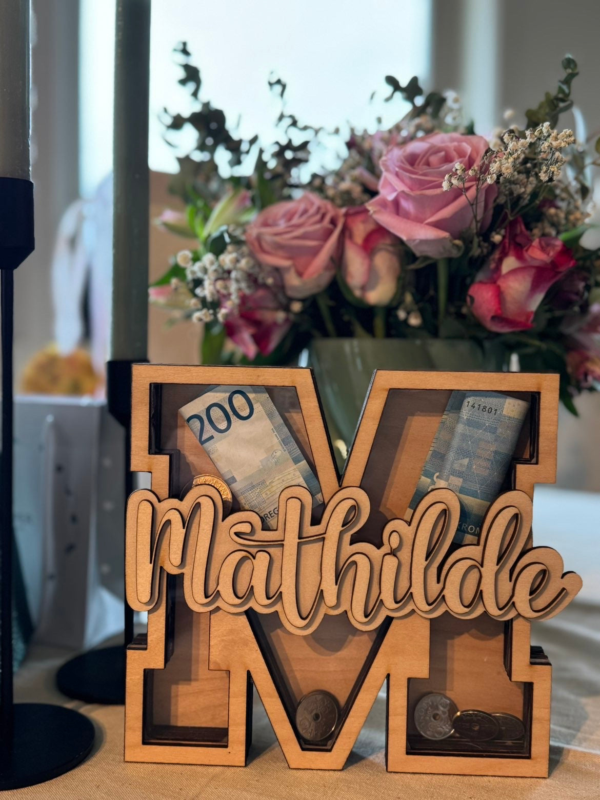 Bokstav sparebørse med navn