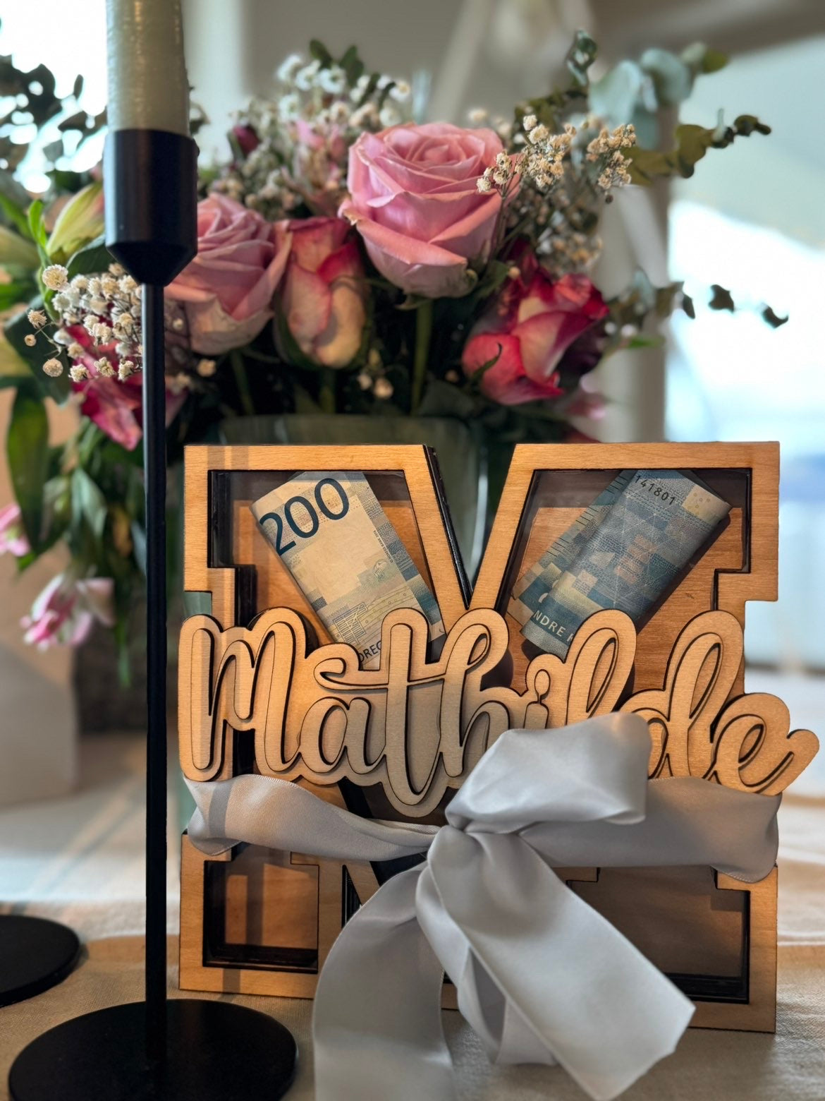 Bokstav sparebørse med navn